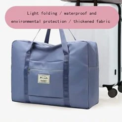 Portable Travel Duffel Bag, Large Capacity Foldable Tote Shoulder Bag, Lightweight Waterproof Carry On Luggage Sport Gym Bag (Light Blue) -Travelpro Shop 41XhEaHJ3TL