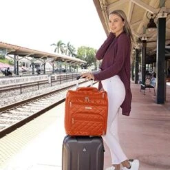 16.5" Underseat Women Luggage Carry On Suitcase - Small Rolling Tote Bag With Wheels (Orange) -Travelpro Shop 51nAa 02VWL